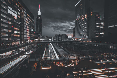 High angle view of illuminated buildings in city at night