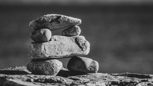 Close-up of stone stack on rock