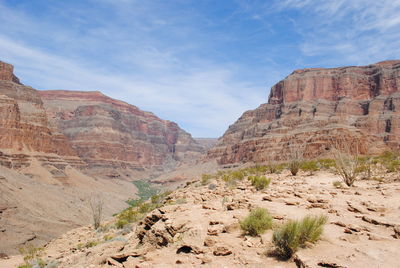 View of rocky mountains against sky