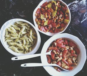 Three bowls with food