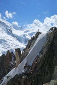 Aiguille du midi against sky during winter