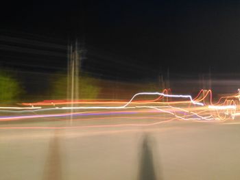 Light trails on road at night