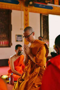 People sitting in temple