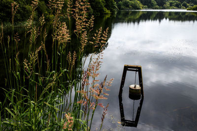 High angle view of boat moored in lake