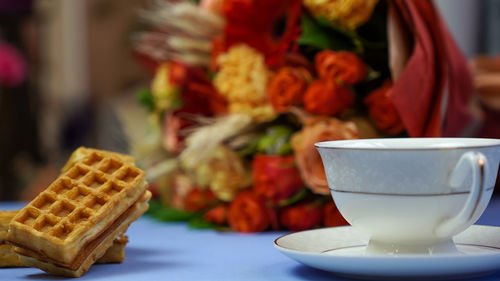 Close-up of coffee served on table