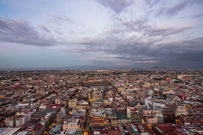 High angle view of townscape against sky at sunset