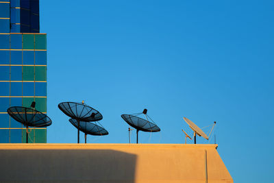 Satellite dish on a tall building