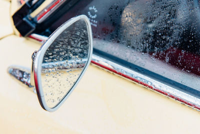 Close-up of wet car window