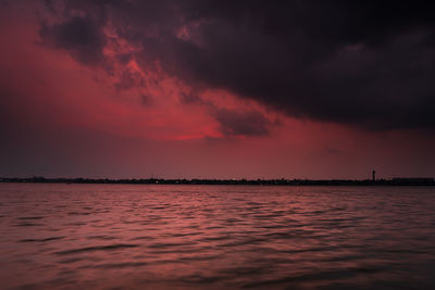 Scenic view of sea against dramatic sky