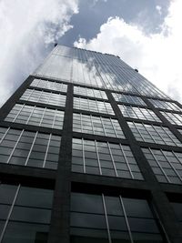 Low angle view of modern building against sky