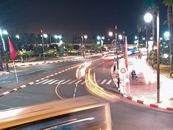 Light trails on city street at night