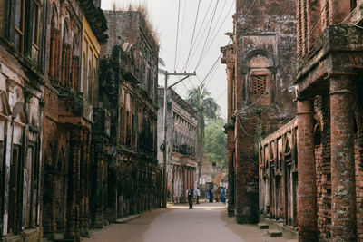 Street amidst old buildings in city