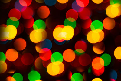 Defocused image of illuminated lights at night