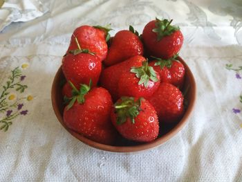 High angle view of strawberries on table