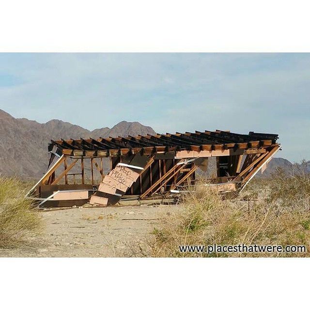 built structure, architecture, transfer print, building exterior, auto post production filter, sky, house, abandoned, old, damaged, obsolete, day, run-down, outdoors, low angle view, wood - material, deterioration, roof, no people, mountain