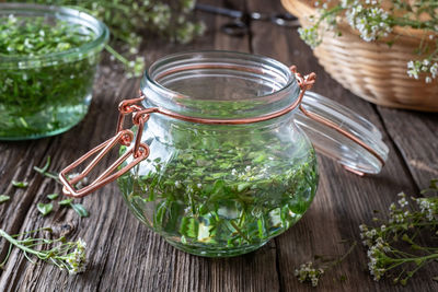 Close-up of glass jar on table