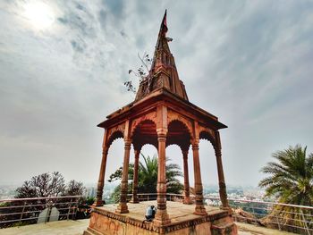 Low angle view of temple building against sky