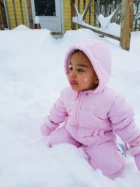 Portrait of cute girl in snow