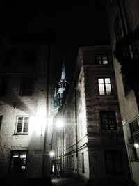 Low angle view of building against sky at night