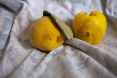 High angle view of yellow fruits on table