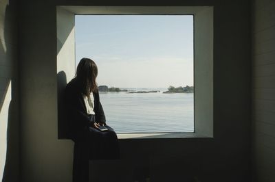 Reflection of woman in water