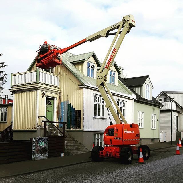 building exterior, architecture, built structure, sky, industry, house, construction site, transportation, day, crane - construction machinery, outdoors, construction, residential building, residential structure, development, no people, factory, mode of transport, red, freight transportation