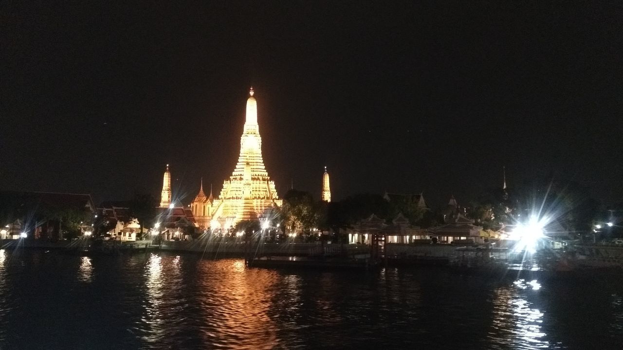 ILLUMINATED BUILDINGS AT NIGHT