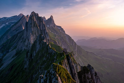 Panoramic view of mountains against sky during sunset