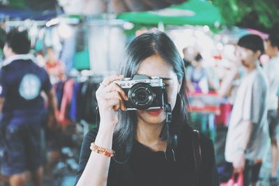 Portrait of man photographing