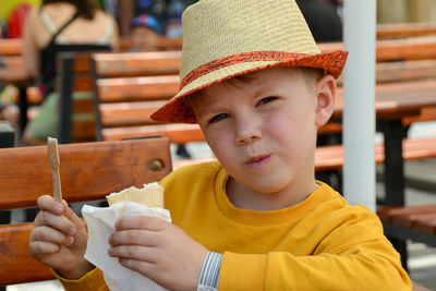 Portrait of cute girl holding ice cream