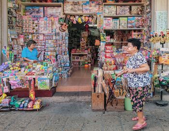 People at market stall