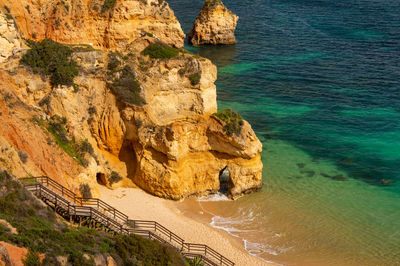 High angle view of rock formation in sea