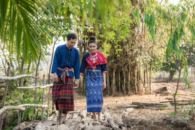 Pre wedding shoot inside garden in thai traditional dress costumes