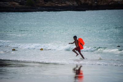 Full length of man on beach