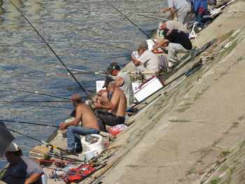 High angle view of people on boat in sea