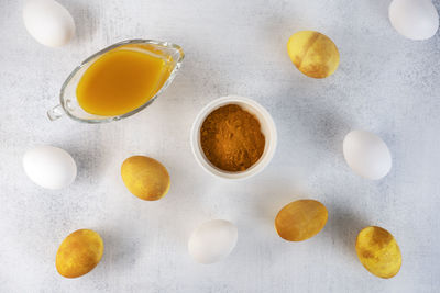 Yellow and white easter eggs. natural coloring easter eggs with turmeric powder in yellow color.