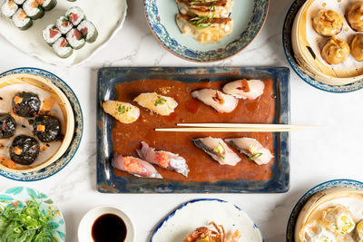 View from above of various asian food dishes