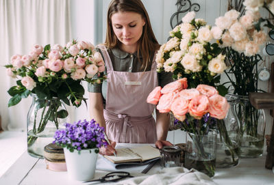 Woman holding flower bouquet