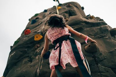 Woman bouldering