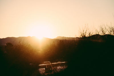 Scenic view of mountains at sunset