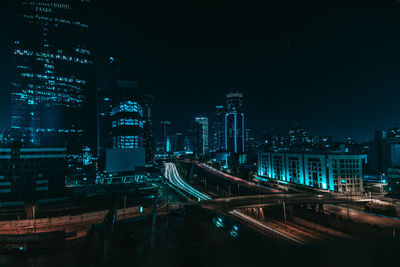 Illuminated cityscape at night