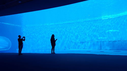 Man and woman at aquarium