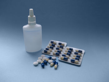 High angle view of bottles on table