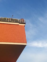 Low angle view of building against blue sky