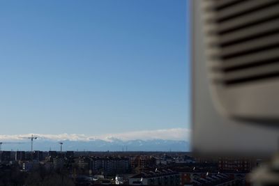 Cityscape against clear sky