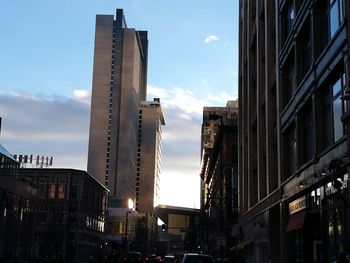 Low angle view of buildings in city against sky