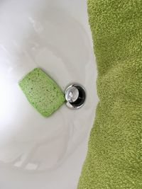 Sponge and towel on the sink