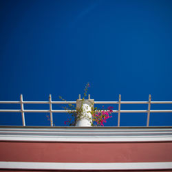 Low angle view of statue against clear blue sky