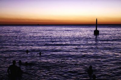 Scenic view of sea at sunset