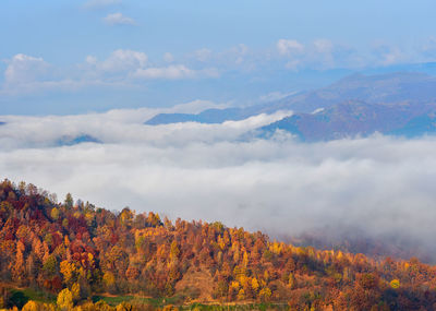 Scenic view of mountains against sky during autumn